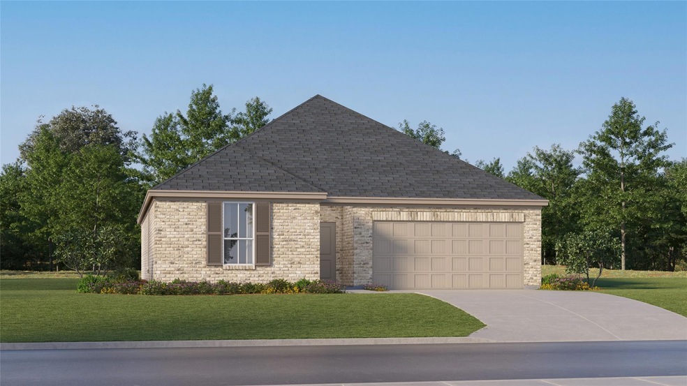 View of front of house featuring a garage and a fr
