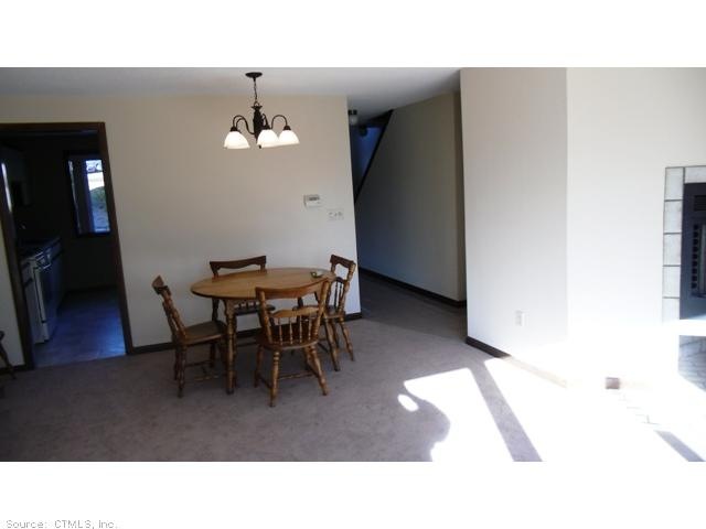 Living Room. Brand new carpet throughout the unit.