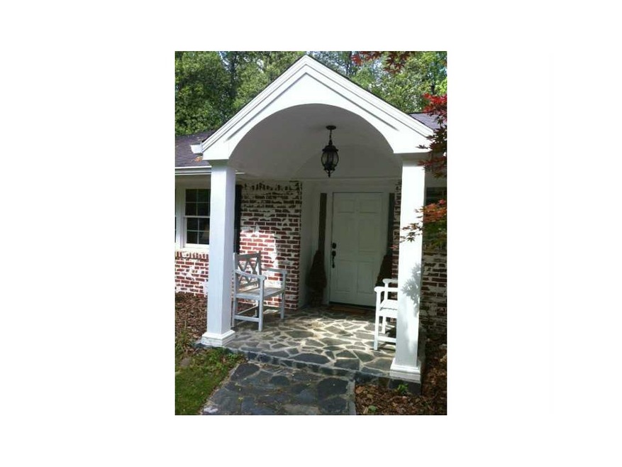 Exterior Front. Charming entry with covered porch.