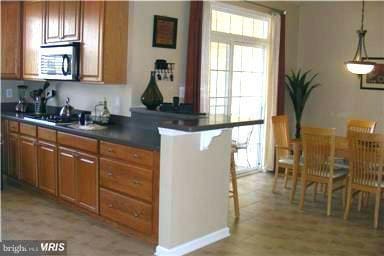 22711 Settlers Trail Terrace unit 11F, Ashburn, VA 20148 - photo 1