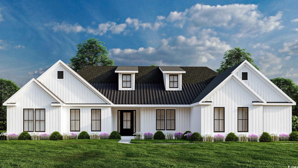 Modern farmhouse style home with a front lawn