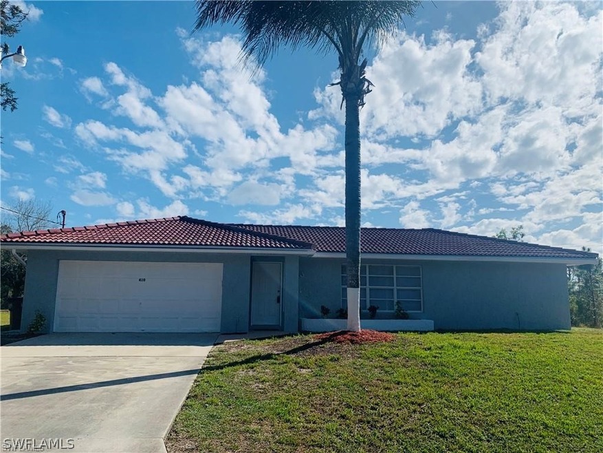 410 Broadmoor St, Lehigh Acres, FL 33974 - photo 1