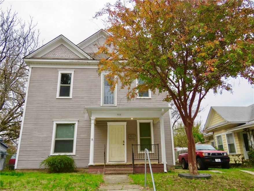 Front of property.  Parking on the South side (where pickup is)