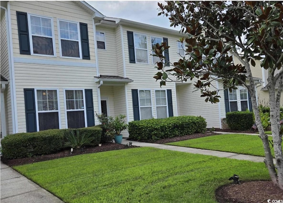 View of front of home featuring a front lawn