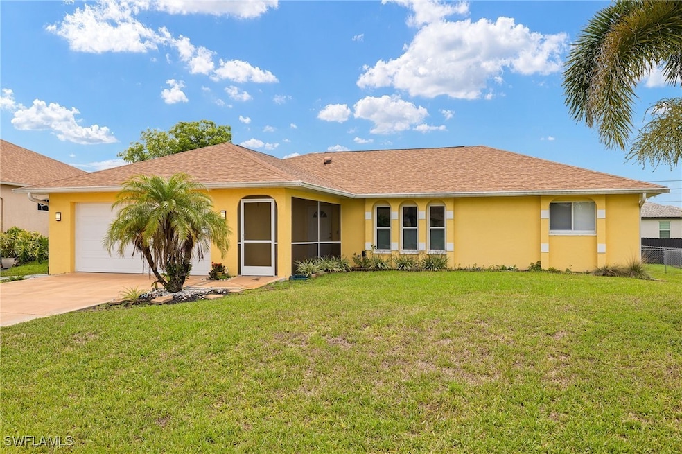 Ranch-style house with stucco siding, a garage, an