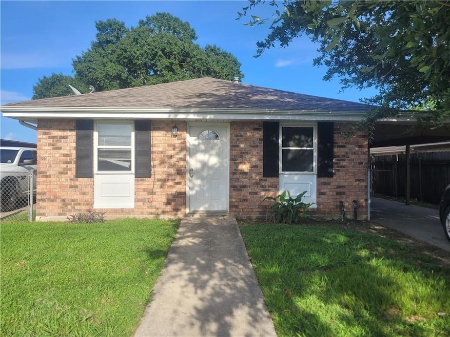 GREAT DUPLEX WITH CARPORT & FENCED YARD