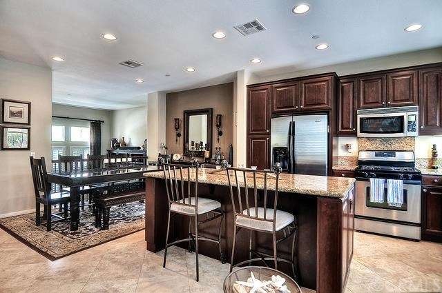 Highly upgraded kitchen with open layout.