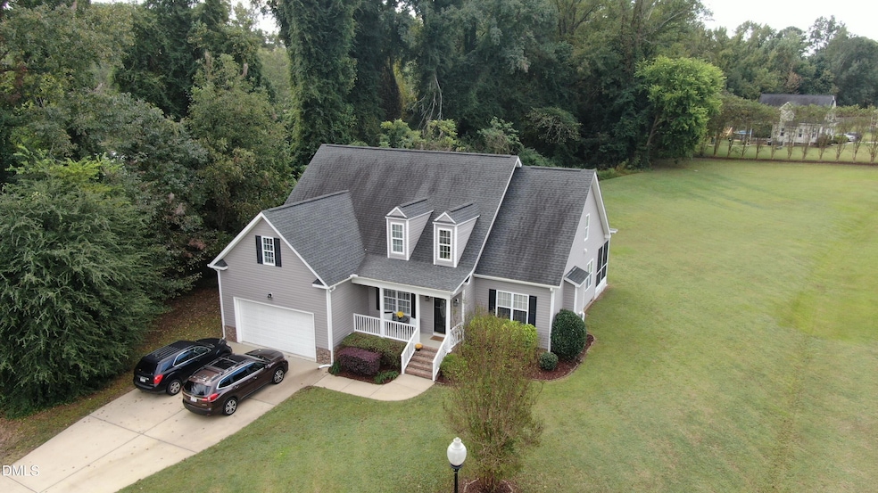 2426 Rolling Tracks Rd, Willow Spring, NC 27592 - photo 1