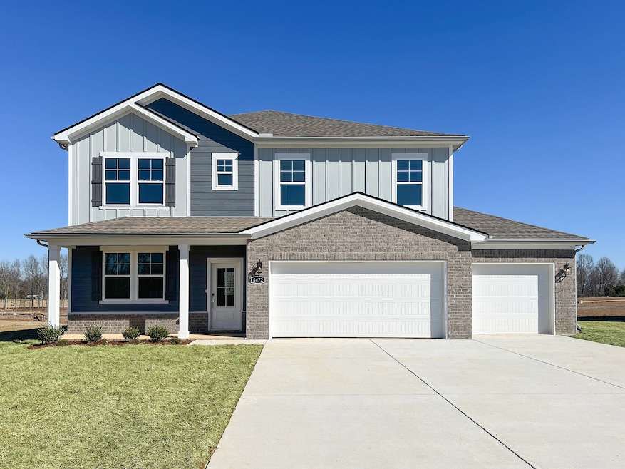 Photo is of a recently completed home with a similar front elevation