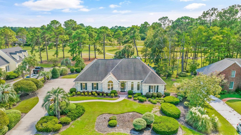 Exterior space featuring a front lawn