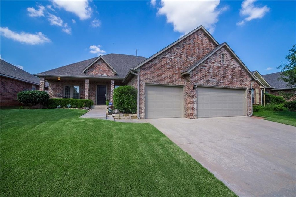 Impeccable three car garage home in gated communit
