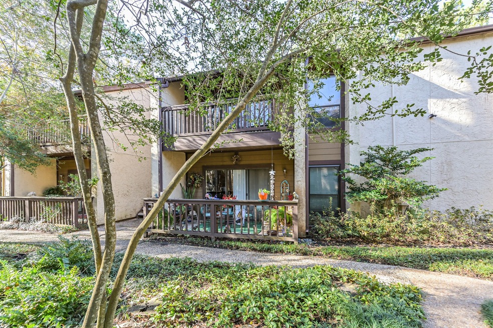 This charming townhome features a private balcony