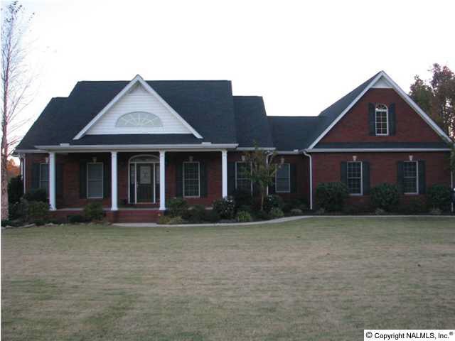 Beautiful 4 or 5 bedroom, full brick home just 10 minutes from Redstone Arsenal! Sprinkler system installed in front yard and in landscaped beds