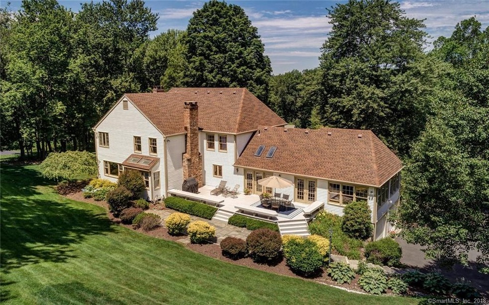 Stunning Colonial prominently sited on lush proper