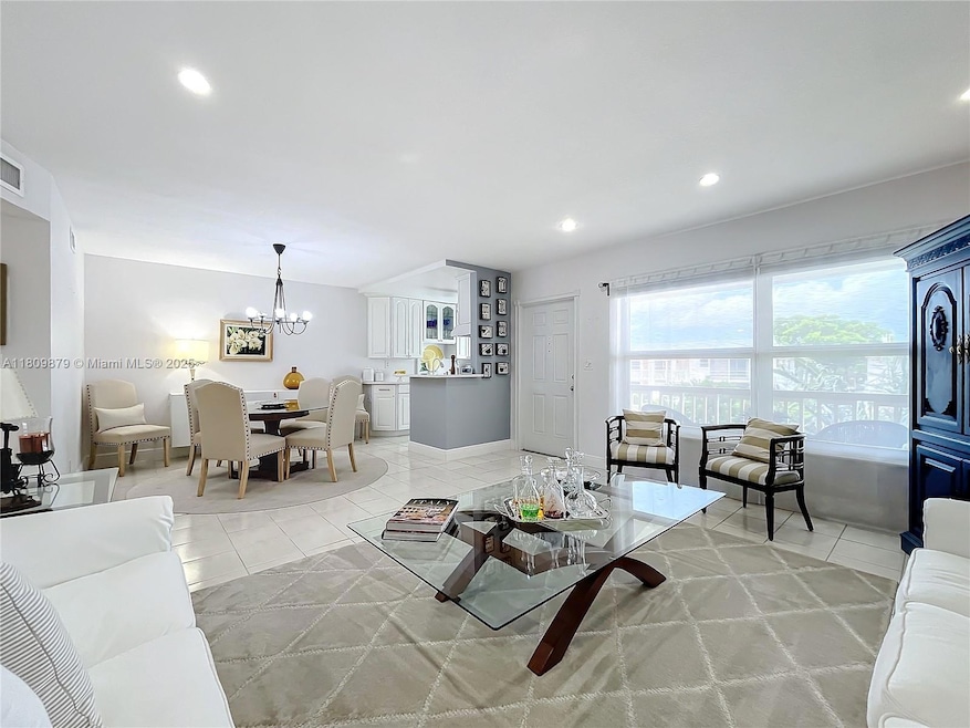 Enter into a luxurious living room area with hat lighting and room to entertain and socialize.