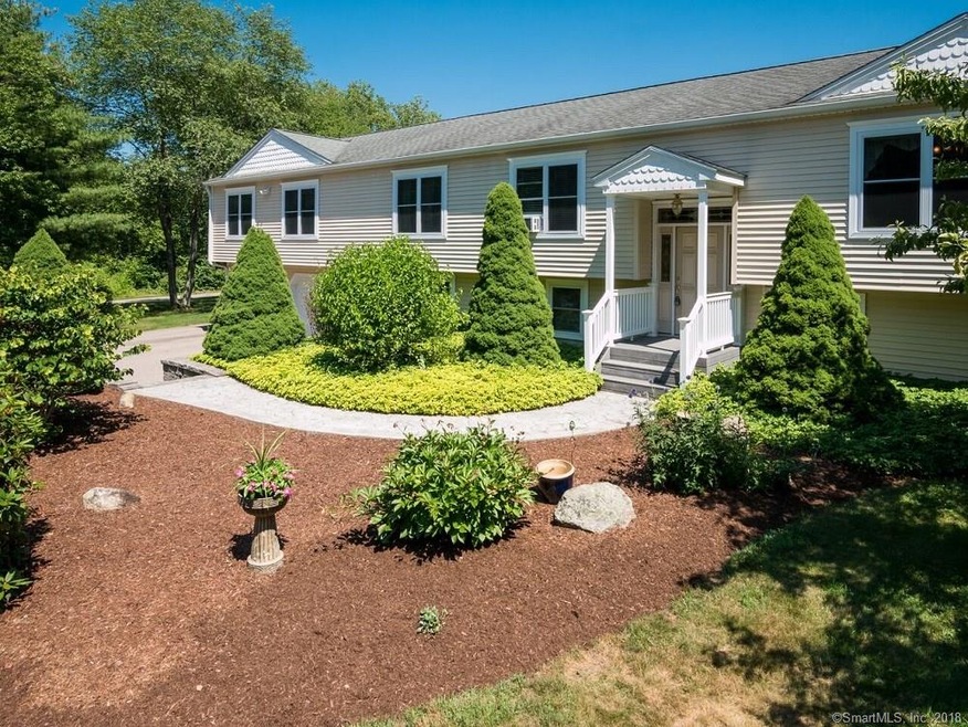 Front View Of Home with Beautiful Landscaping