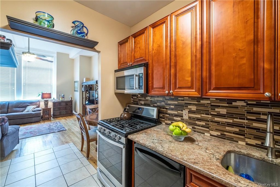 updated kitchen looking into the living room/dinin
