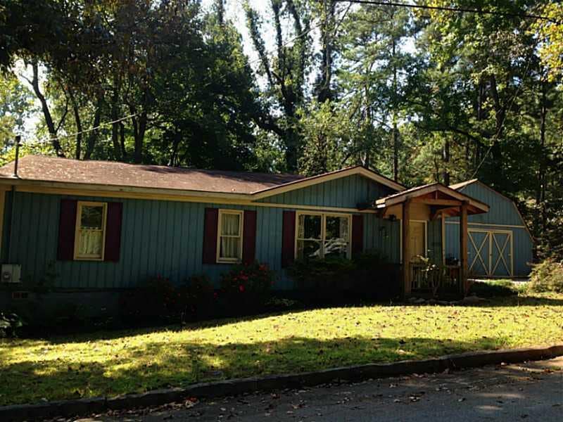 Exterior Front. Sweet cottage sits on lovely lands