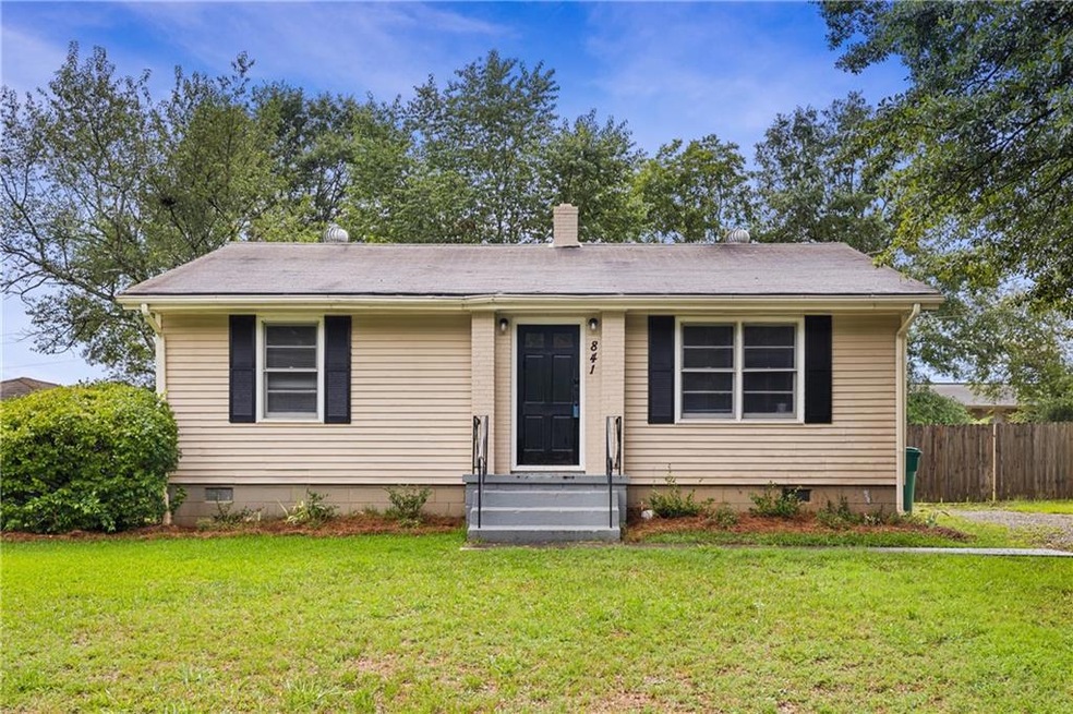 View of front of property with a front lawn