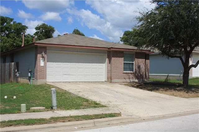 Exterior front of home with two car garage.