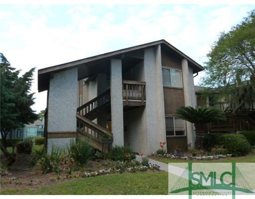 Exterior Front. First floor end unit with added li