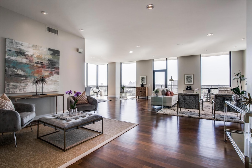 Gorgeous living room with two sitting areas leadin