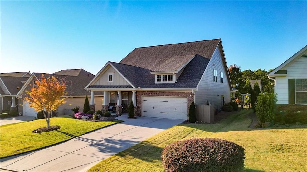 Craftsman-style home featuring a front lawn and a 