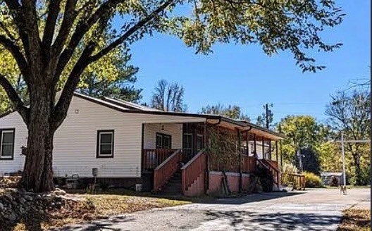 509 W Sherry Ln, Broken Bow, OK 74728 - photo 1