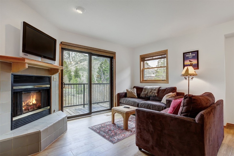 Living room featuring light wood-type flooring and
