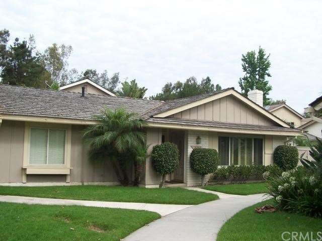 Front of the home showing greenbelt 