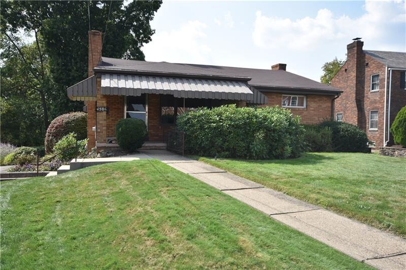 Front of House and Front Yard. Almost Level Entry 