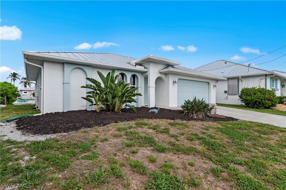 Single story home featuring a garage