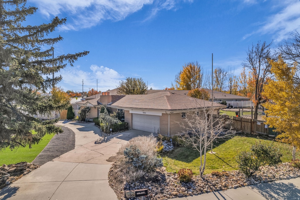 View of front of house featuring an attached garage and driveway