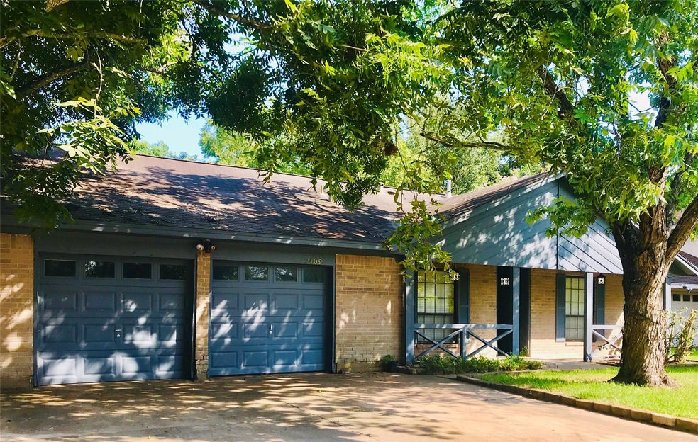 Home features long front porch, and mature pecan trees which offer lots of shade.
