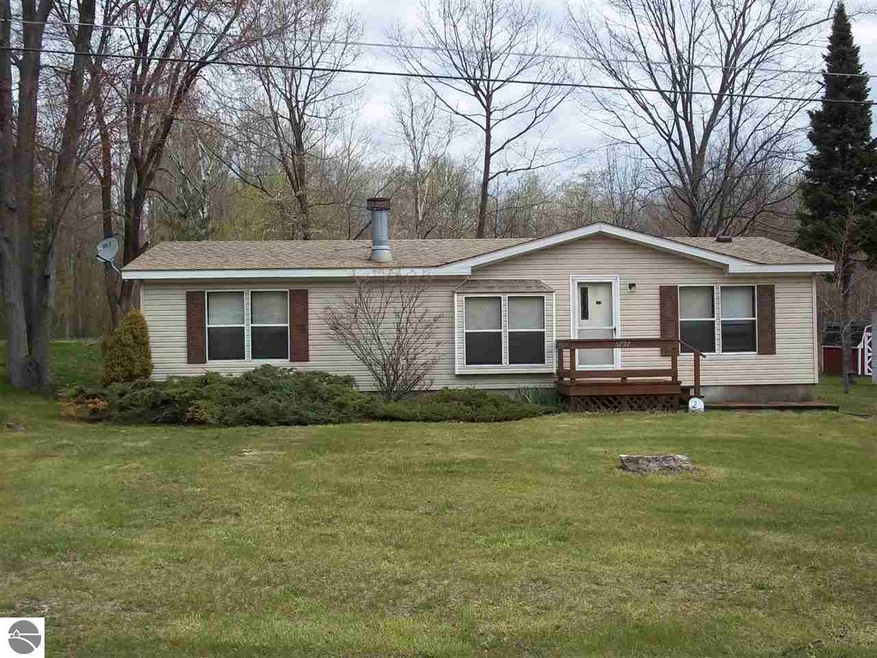 5797 Prescott Dr, Tawas City, MI 48763 - photo 1