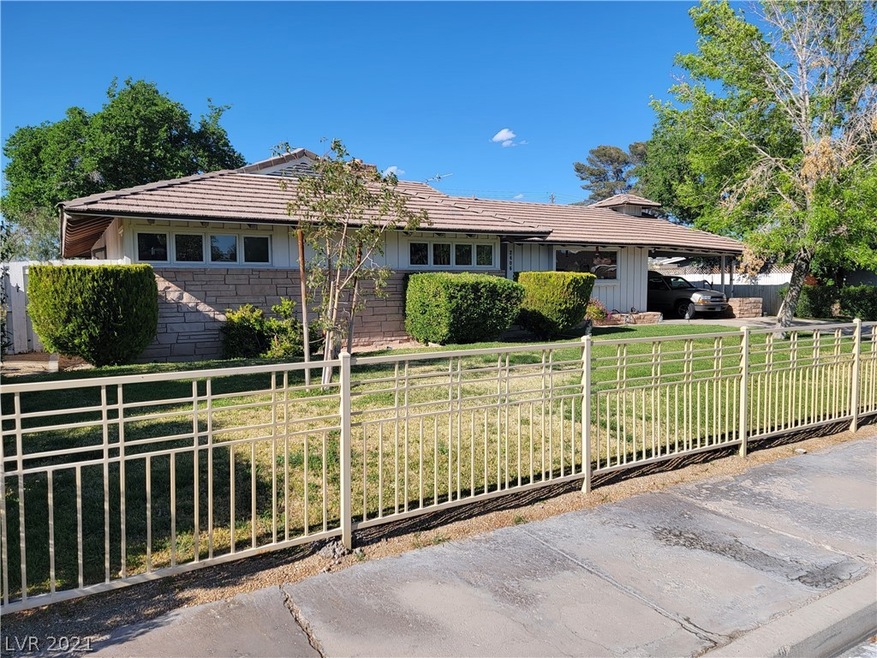 Gated driveway and front yard