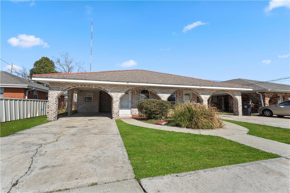 317 E Saint Avide St, Chalmette, LA 70043 - photo 1