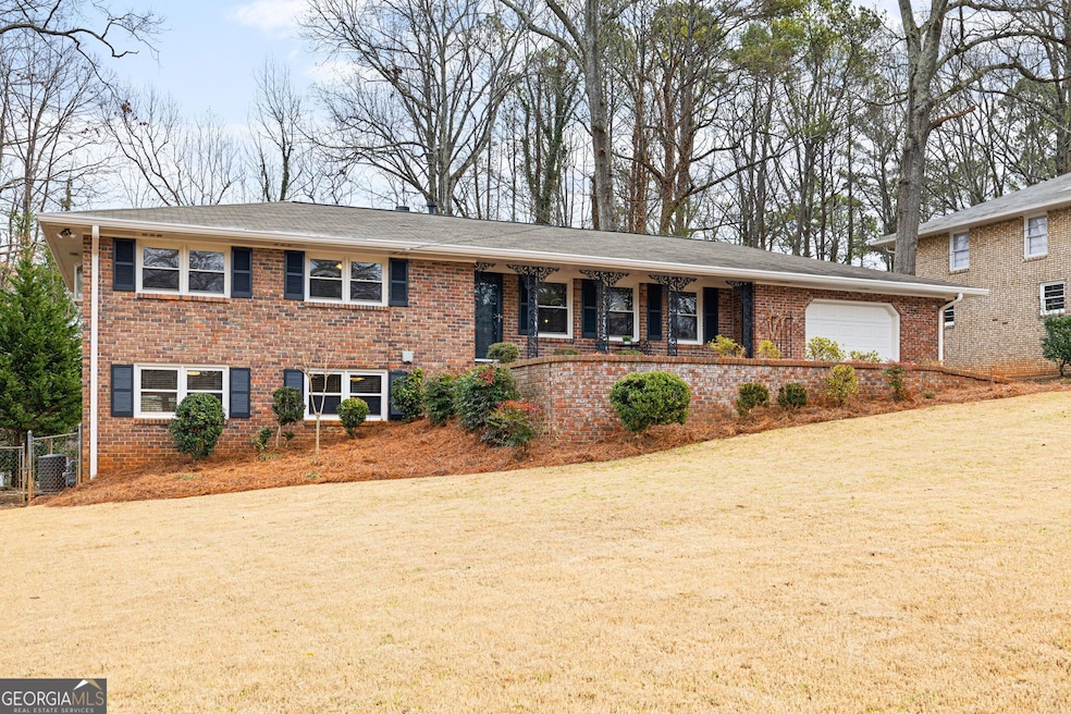 1326 Hickory Dr SW, Lilburn, GA 30047 - photo 1