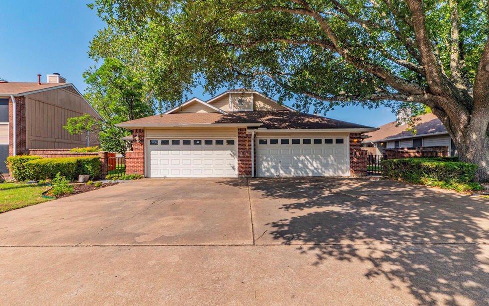 View of front of house featuring brick siding, co