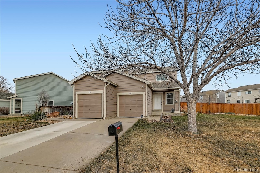 892 Mockingbird Ln, Brighton, CO 80601 - photo 1