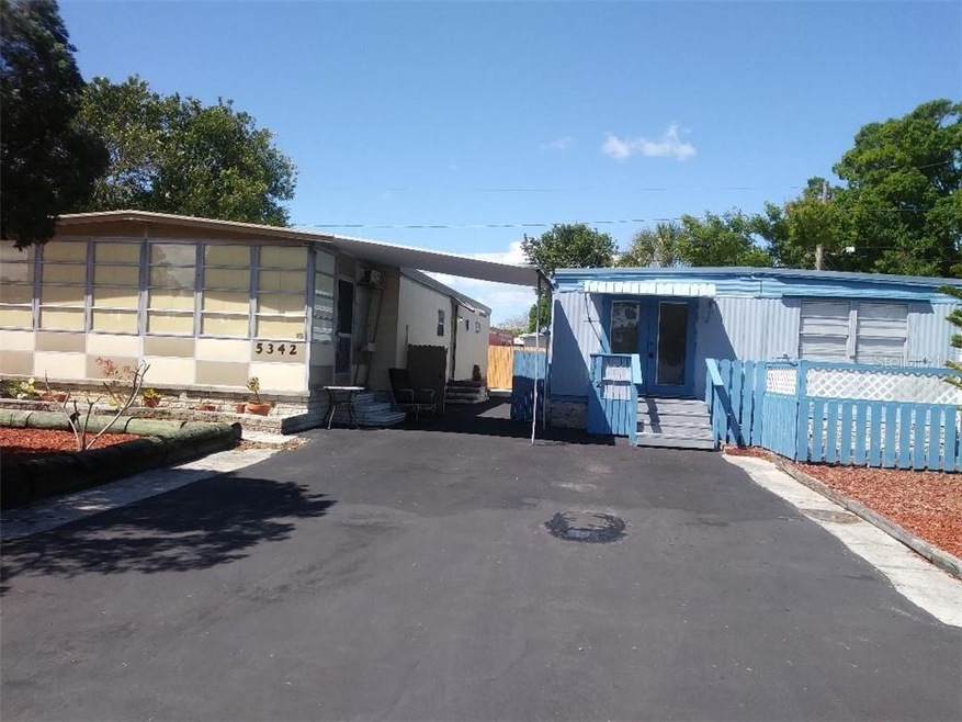 Front of Yellow and Blue Homes