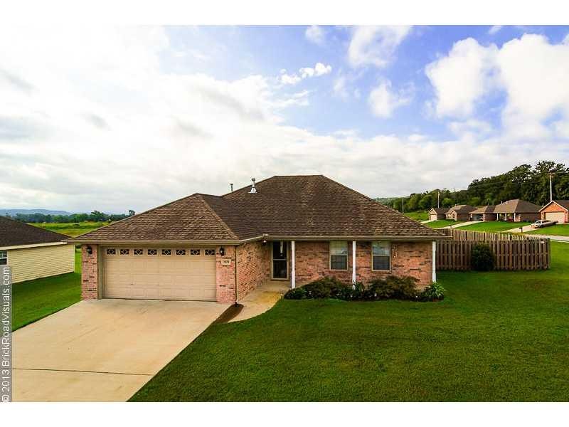 Exterior Front. Super cute home with a two car gar
