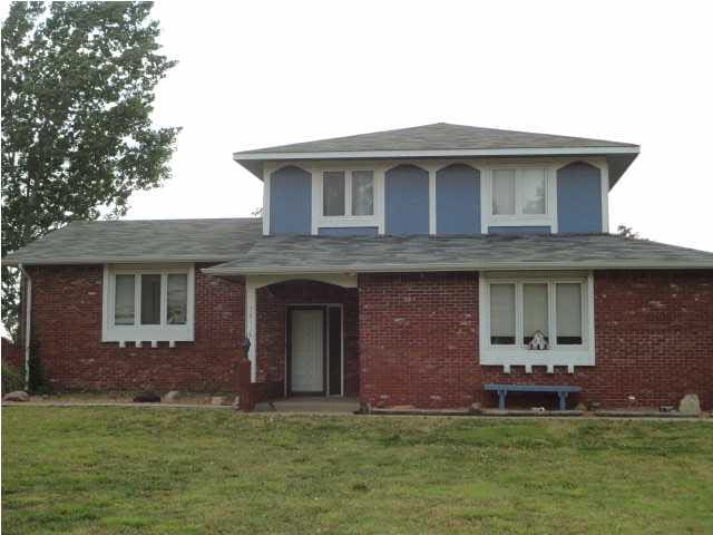 View of front of the house. Side load garage.