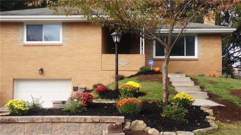 Beautiful Landscaping and new retaining wall and g