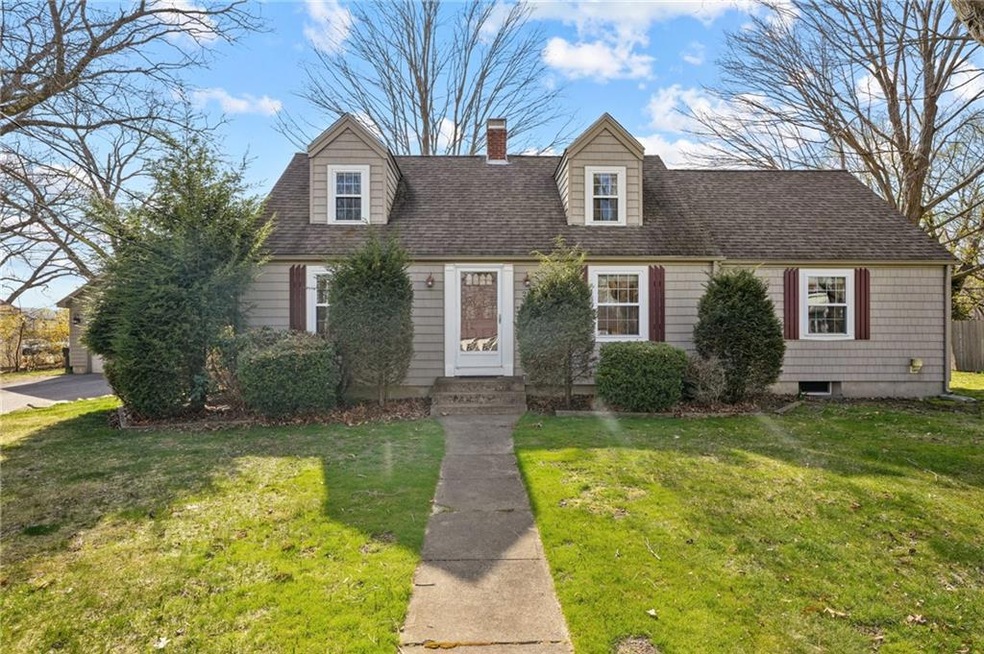 Welcome home to this gorgeous dormered Cape on an