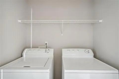 Clothes washing area featuring independent washer 