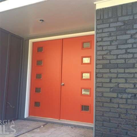 All brick Mid-Century Modern large home with 4br a