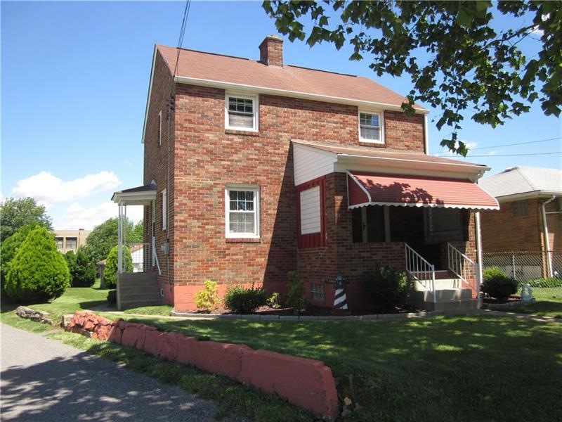 Professionally landscaped, well appointed brick ho