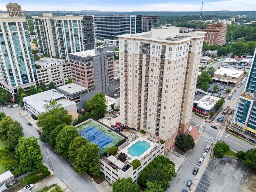 View of urban area featuring a pool