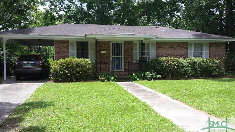 Exterior Front showing carport, front porch and me